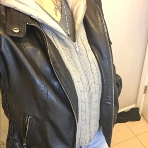 Wilson’s black leather jacket